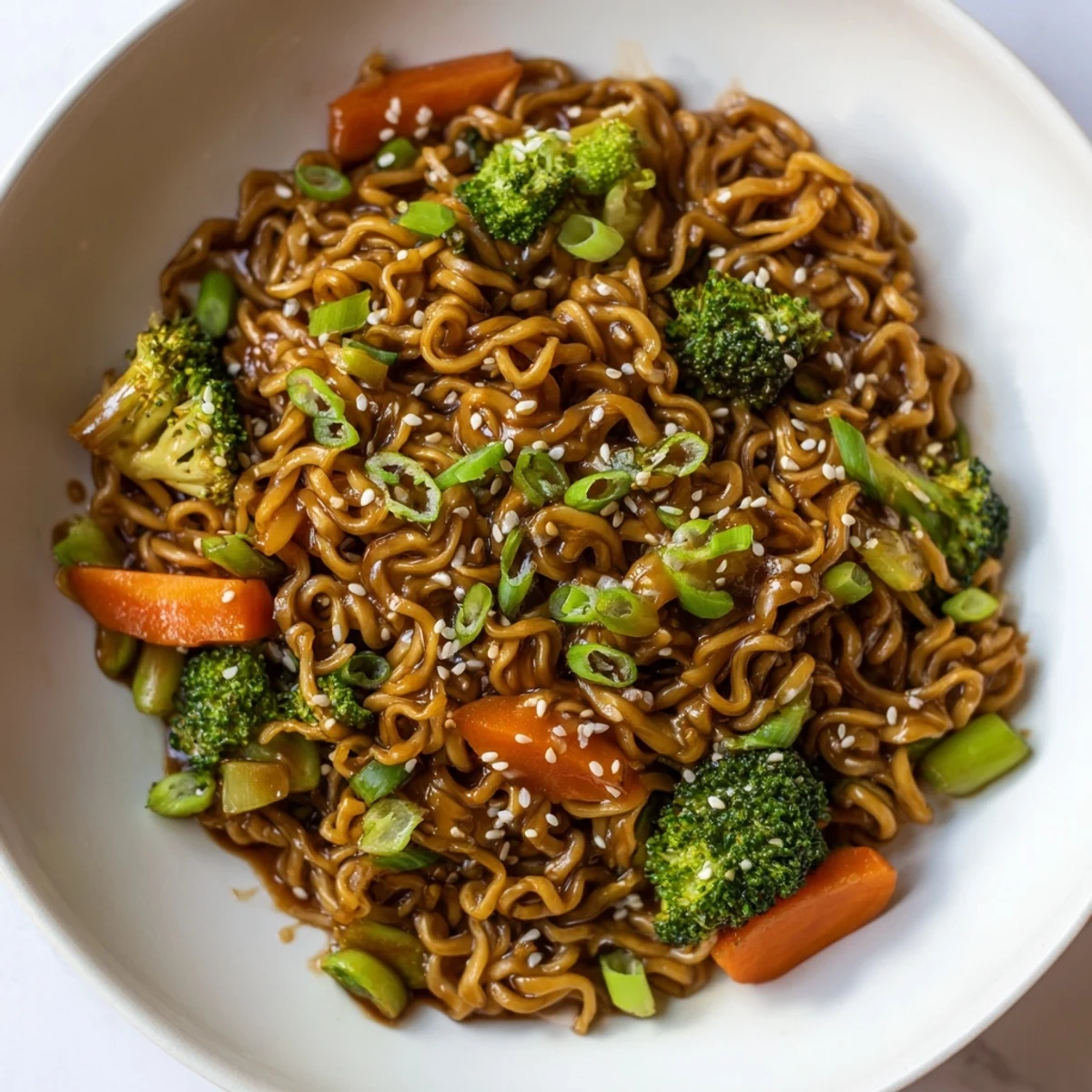 Weeknight-ready image: Flavorful Ramen Noodle Stir-Fry Remix with a glossy sauce, perfect for a quick dinner.