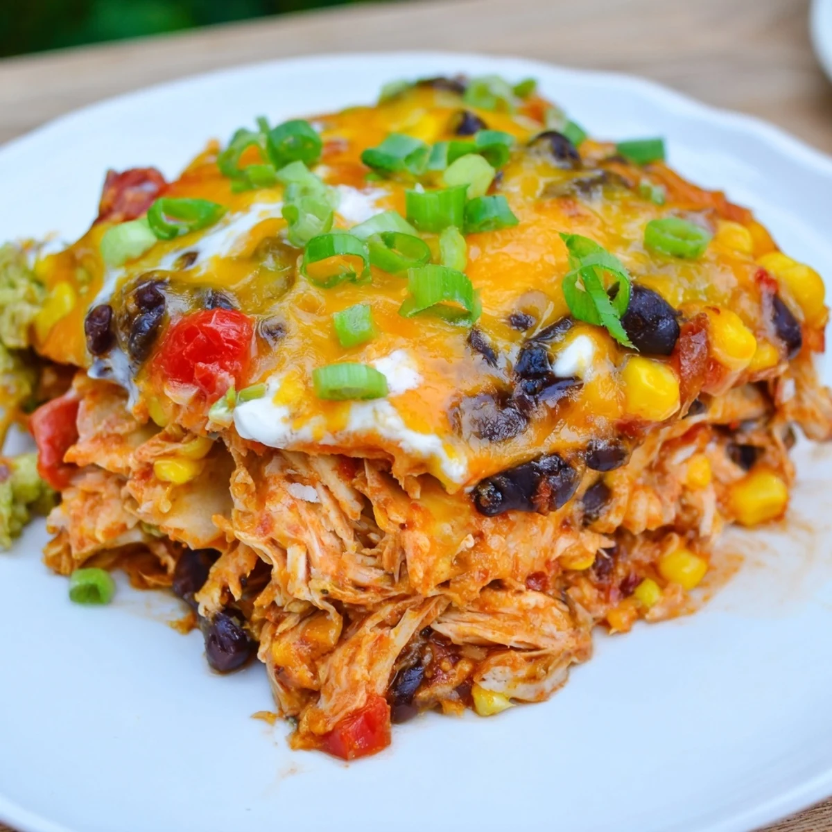 Warm, creamy Taco Bell Copycat Chicken Bake: baked tortillas layered with flavorful chicken and cheese, ready to serve.