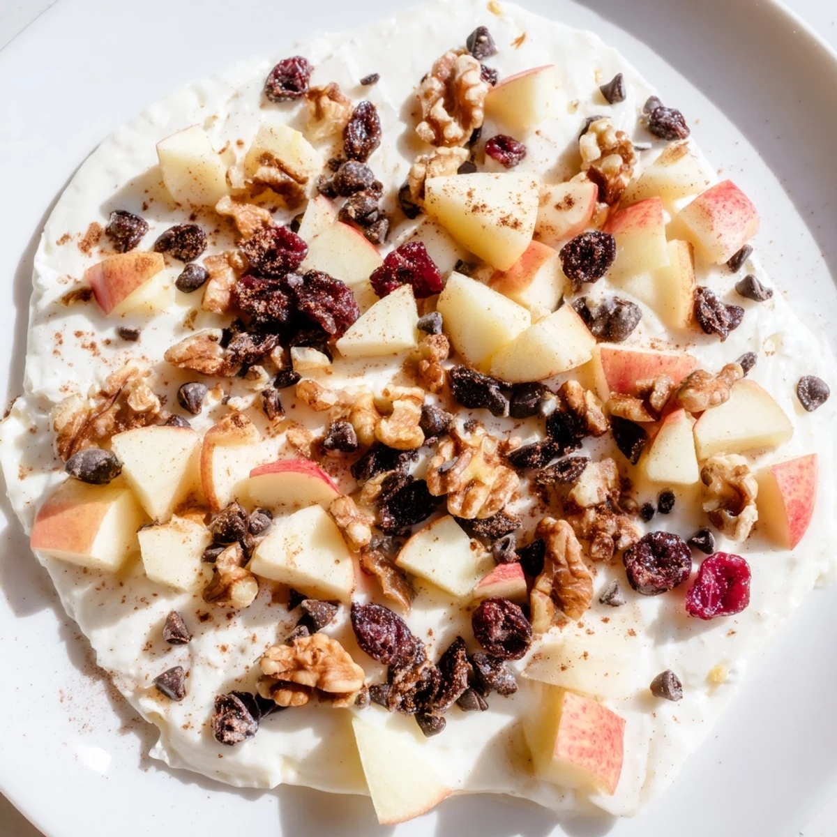 Frozen Apple Cinnamon Yogurt Bark, a refreshing snack loaded with sweet apples and crunchy walnuts.