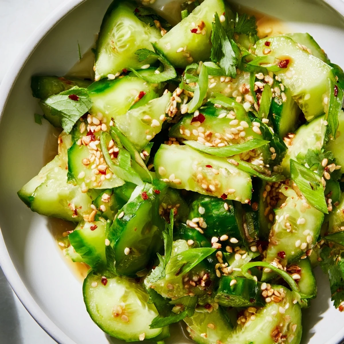 Smashed Cucumber Salad: Bright, colorful salad with glistening cucumbers and a spicy sesame dressing.