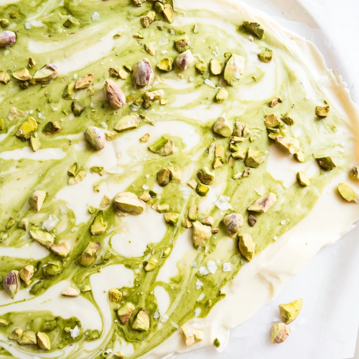 Homemade Pistachio Matcha White Chocolate, a beautiful dessert bark with a lovely, textured pistachio topping, ready to enjoy.