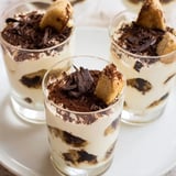 Beautiful close-up of creamy, layered deconstructed Tiramisu shots, ready for a dessert party or special treat.