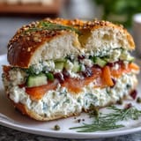 High-protein cottage cheese bagels topped with smoked salmon, cream cheese, and fresh dill for a flavorful brunch.