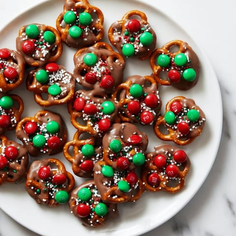 Air Fryer Christmas Pretzel Bites: Warm, chocolate-covered pretzels, sprinkled with holiday cheer, a perfect treat.