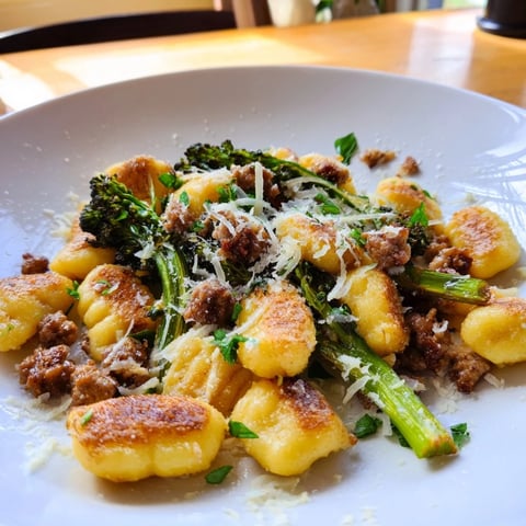 Golden-brown, crispy gnocchi and savory Italian sausage roasted with tender broccolini on a sheet pan.  