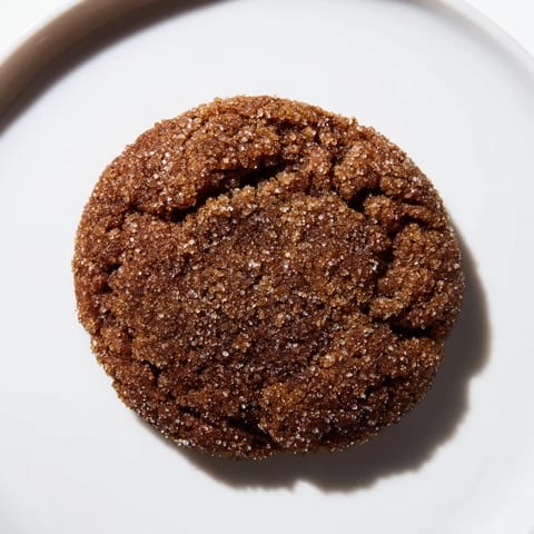Warm and flavorful Chewy Soft Molasses Cookies, perfectly spiced, right out of the oven, smelling divine.
