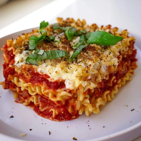 A comforting, cheesy view of homemade Ramen Lasagna, a delicious and easy fusion dish.