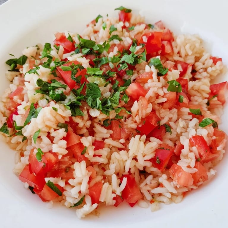 Flavorful Tomato-Rice Skillet Dinner: This photo shows a close-up of the delicious, cooked rice.