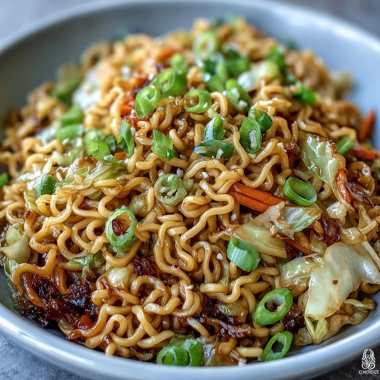 Sizzling wok with freshly tossed Fried Cabbage Ramen, steam rising from tender cabbage and chewy noodles.